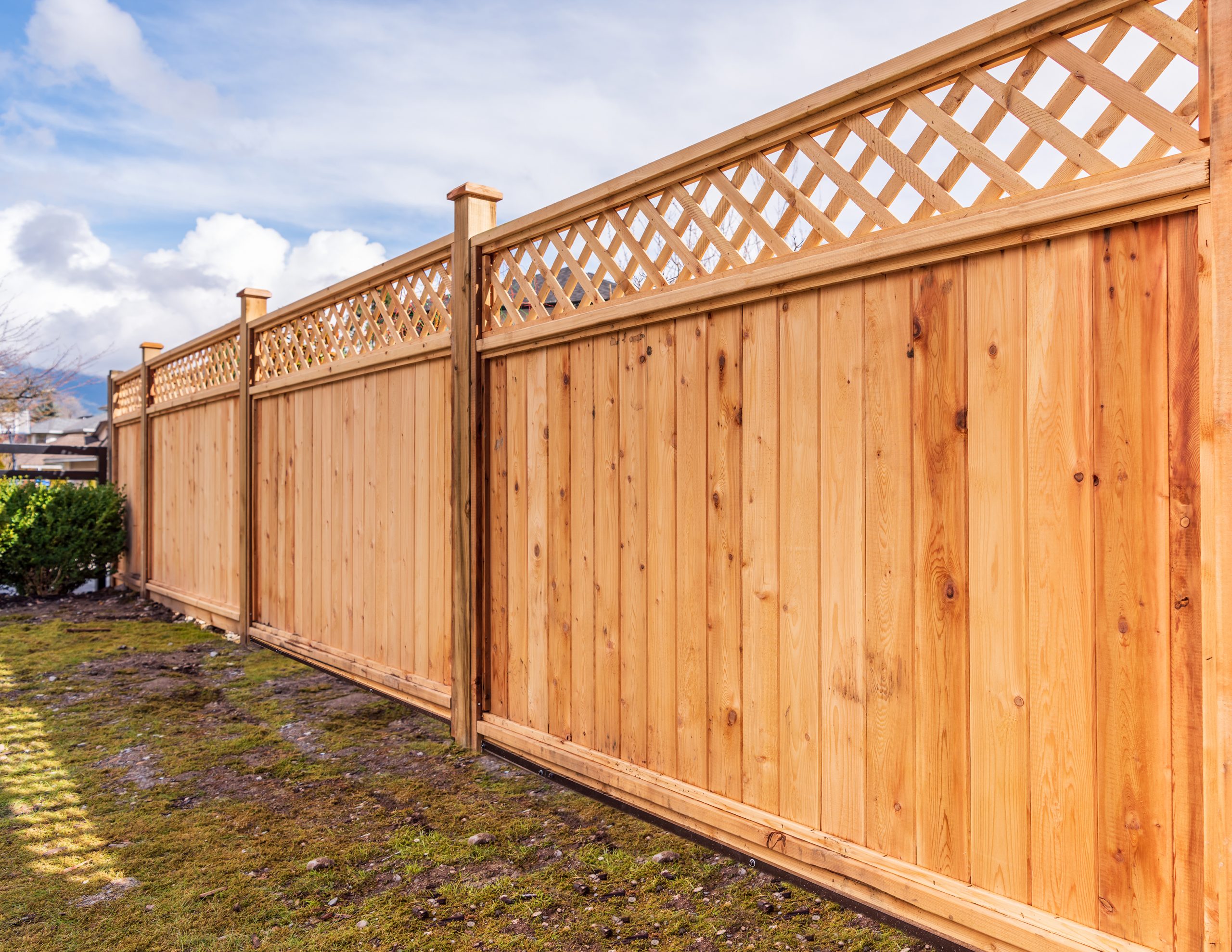 Fence built from wood. Outdoor landscape. Security and privacy concept. Vancouver. Canada.; Shutterstock ID 1696616185; Usage Month: -